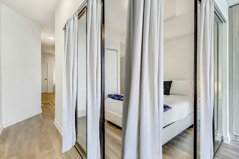 “Sunny, well-designed bedroom near top attractions—perfect for longer stays”  “Private, peaceful bedroom with workspace and blackout curtains”