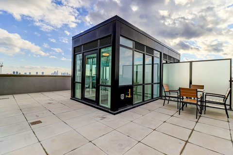 Relax and unwind on the private terrace with stunning city views — perfect for morning coffee or evening drinks under the stars.