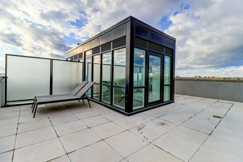 Relax and unwind on the private terrace with stunning city views — perfect for morning coffee or evening drinks under the stars.