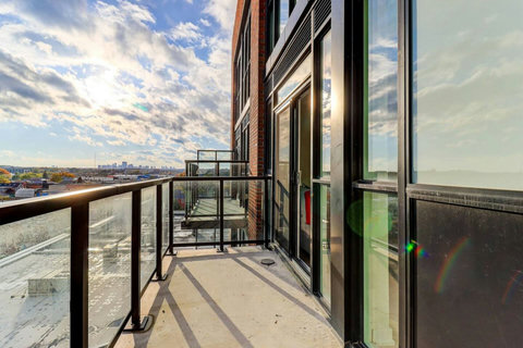 Cozy private balcony for enjoying the fresh air and city views.