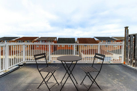 Unwind under the sky in this beautifully designed patio area, blending nature and comfort