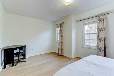 Drift away in this peaceful retreat with a plush queen-size bed.