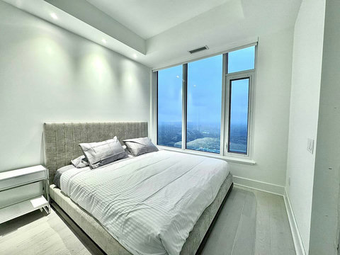 Bright and cozy bedroom designed for comfort and a peaceful night’s rest.