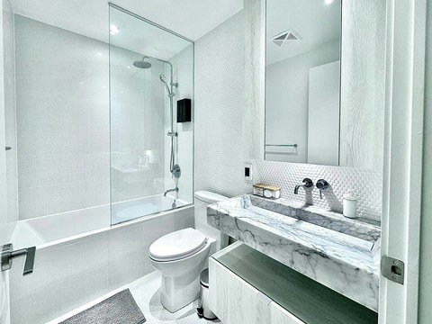 Fresh, bright bathroom designed for comfort and convenience.