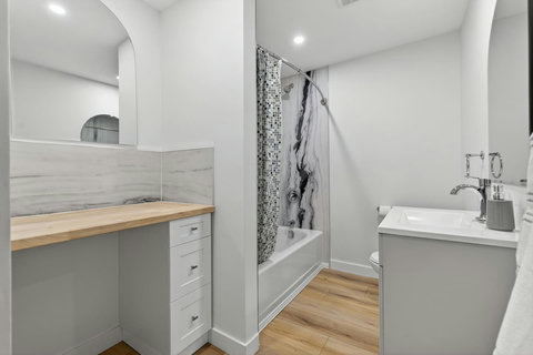 Modern bathroom setup offering a fresh and organized feel.