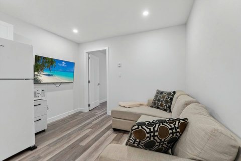 Inviting living room with a simple, modern TV arrangement.