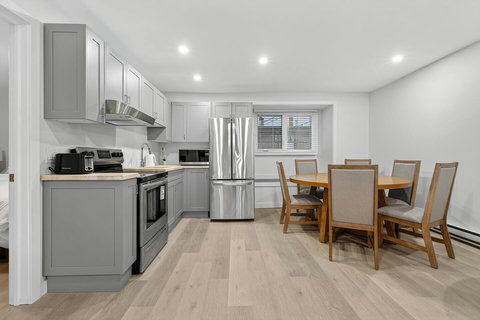 Well-equipped kitchen paired with a cozy dining space for easy home-style cooking