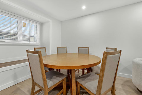 Neat and functional dining area ideal for families and groups.
