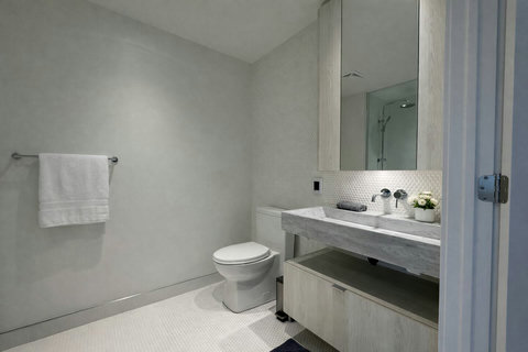 Clean, modern bathroom stocked with essentials.