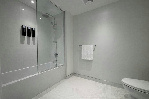 Clean, modern bathroom stocked with essentials.