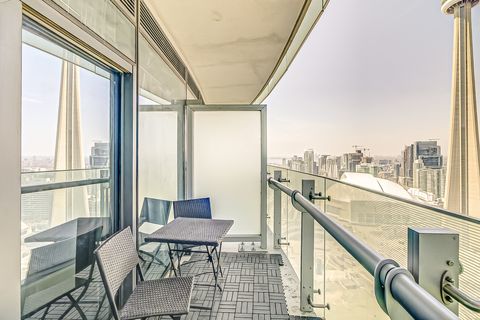 The view from the balcony is superb and you can see the shadow of the CN tower at any time.