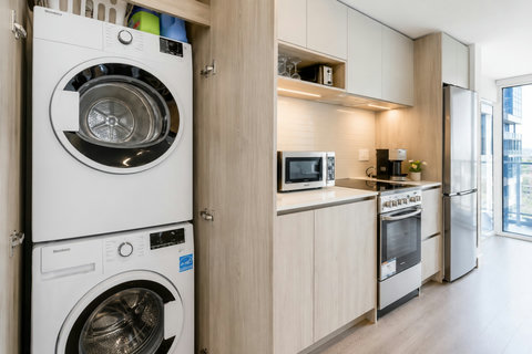Convenient in-suite laundry with a washer and dryer for an easy, comfortable stay.