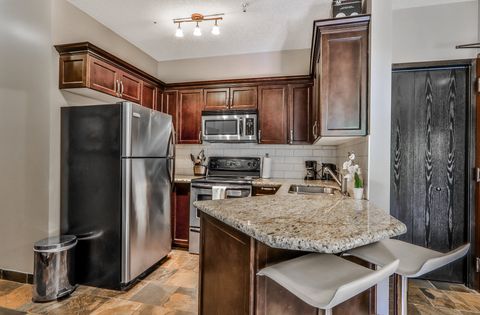 The kitchen is equipped with necessities like refrigerator, microwave, oven, stove etc for making your stay better.