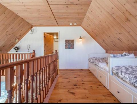 Two double beds in the common space which can easily accommodate 4.