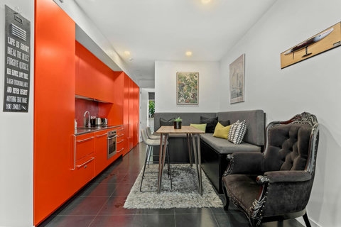 The dining table can be used to eat together, play games or even do a jigsaw puzzle. The kitchen features a fridge/freezer, cooktop, oven, dishwasher, and more.