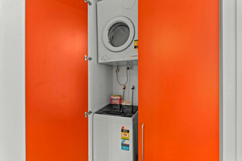 The washing machine and dryer are handy to have in an apartment.