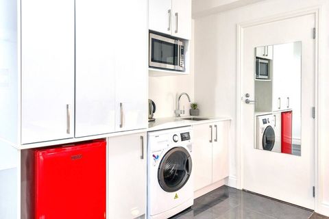 Cute kitchenette and laundry area - perfect for longer stays