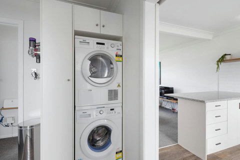 There is also a Dyson stick vacuum in the space. Both are handy is you need to clean clothes while travelling.