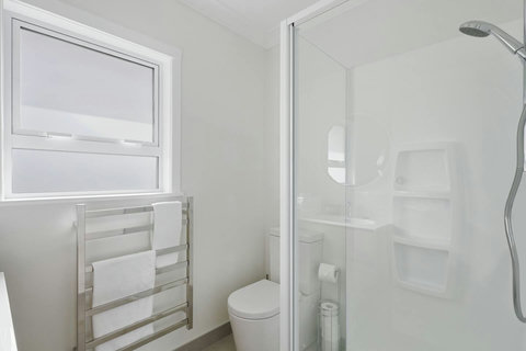 We provide the hotel quality bath towels, hand towels, face cloths and foot mats. We also provide complimentary shower gel, shampoo, and moisturiser. This will get you through your first night at least.