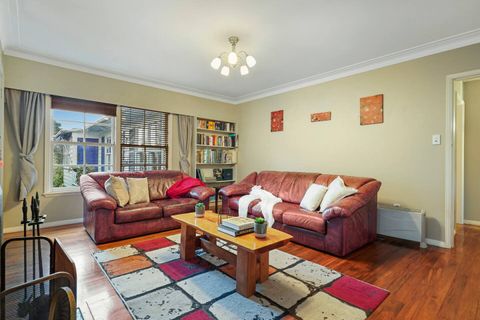 The lounge area is set around the fire place and the flatscreen tv.
