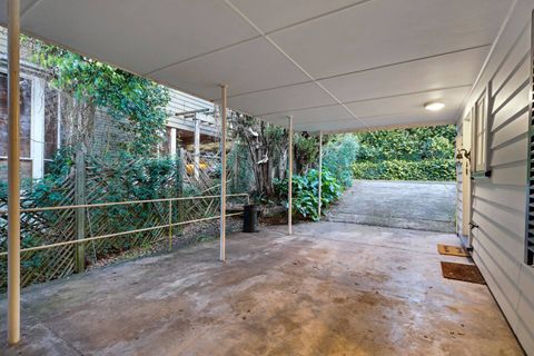 The carport takes one car. Covered and off the street.