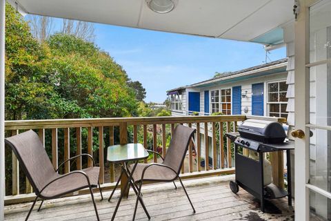 On the balcony there is a small seating area with a cafe table and a bbq for the warmer months.