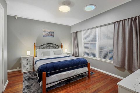 Bedroom one is spacious and relaxing.