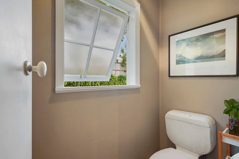 The toilet is separate to the bathroom.