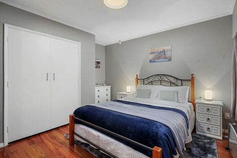 Bedroom one is comfortable and grown up with plenty of storage space.