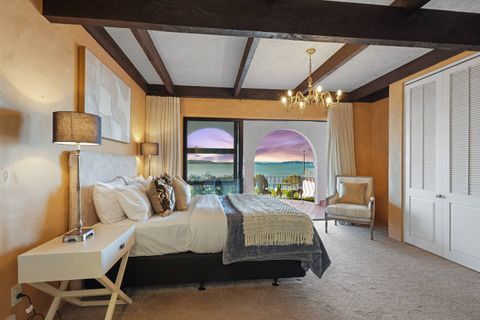 You  have an outdoor table and chairs for your morning coffee.