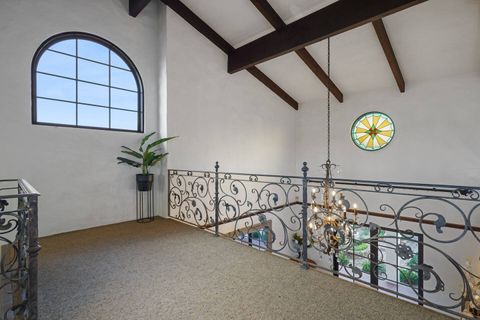 The wrought iron balustrades are another design feature of this house.