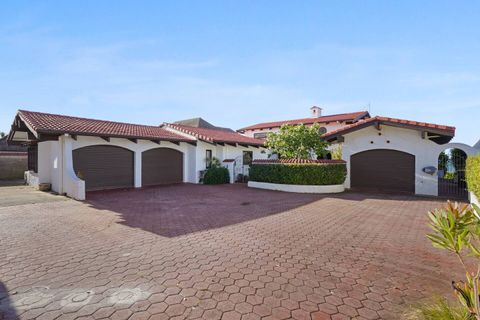 The entry of the home is understated and there is plenty of free off-street parking.