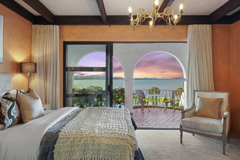 This bedroom is part of the primary suite with the 2nd Empire-style chair.