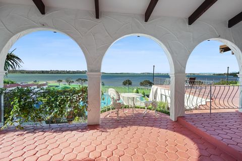 The arcade on the first floor with the terrace looking to the pool and beach.