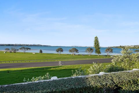 Over the road from the park and beach.