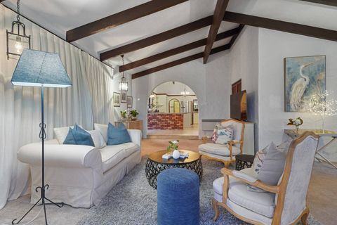 Lounge 2 is a snug off the kitchen with a large flatscreen tv and views out the two ranchsliders.