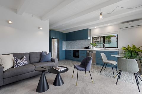 At the end of the downstairs corridor is a self-contained suite with kitchen, diner, lounge, bathroom, and bedroom.