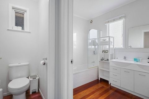 The main bathroom has a separate bathtub which is a luxury with a shower head and bath.