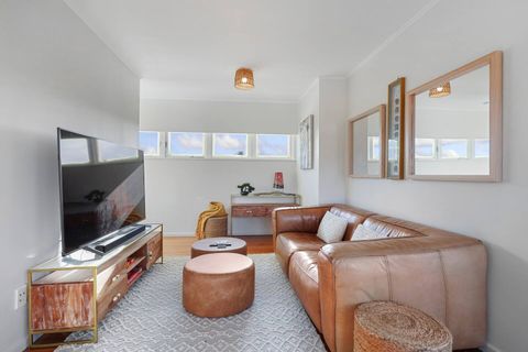 The tv nook with enormous flatscreen tv.