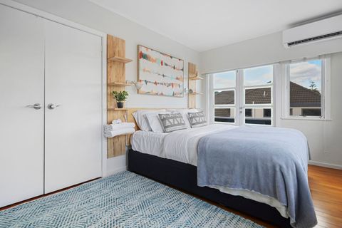 This room opens onto the deck and has a double wardrobe.