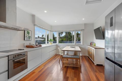The dining room and kitchen are open plan.