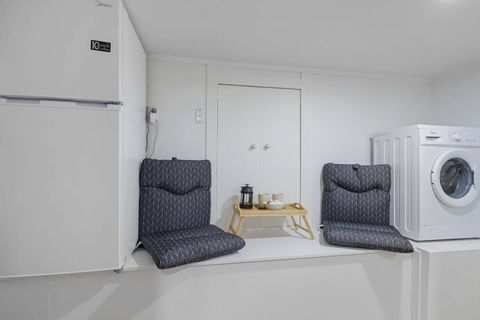 There is a washing machine in the corridor that is great if you are staying for longer.