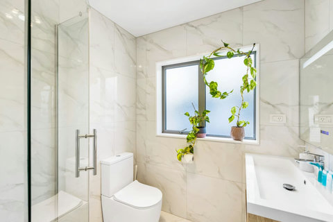 The two other bathrooms have a shower, toilet and vanity unit. There is one upstairs and one downstairs.