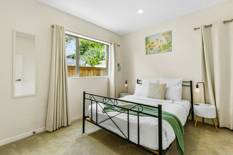 Bedroom three is a great bedroom with restful colors of green and cream.