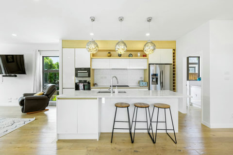 You can eat informally at the large island bench and breakfast bar.