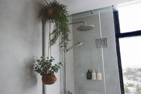 The shower has a rain shower as well as a standard shower head.