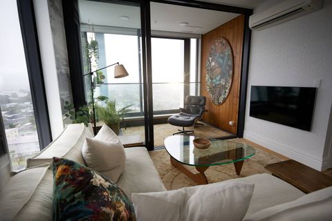 Sit on the comfy couch, watch TV, or tuck yourself away in the balcony area.