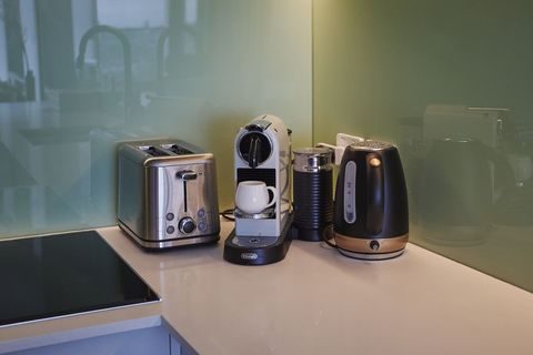 All the benchtop appliances are in this corner - toaster, kettle,  coffee machine and milk frother.