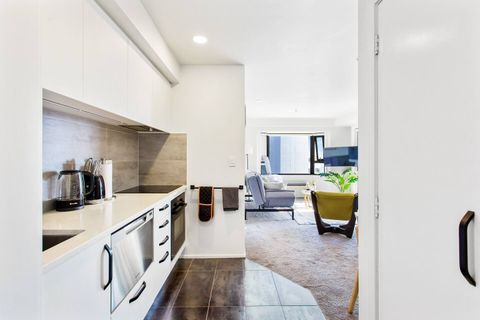 The fully equipped galley kitchen in the open-plan living area.