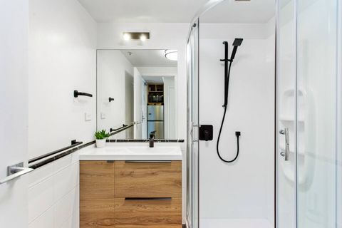 A modern stylish bathroom with shower.